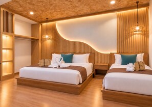 A hotel room with two beds, wooden headboards, and a unique ceiling design. - Painon Resort KohLanta (Ko Lanta)