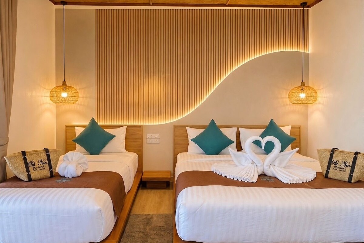 Deluxe Triple Room, Garden View | In-room safe, laptop workspace, blackout drapes, WiFi (free)