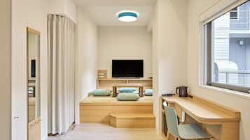 مكتب ومساحة عمل للكمبيوتر المحمول وواي فاي مجانًا وملاءات أسرّة