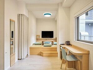 Desk, laptop workspace, free WiFi, bed sheets