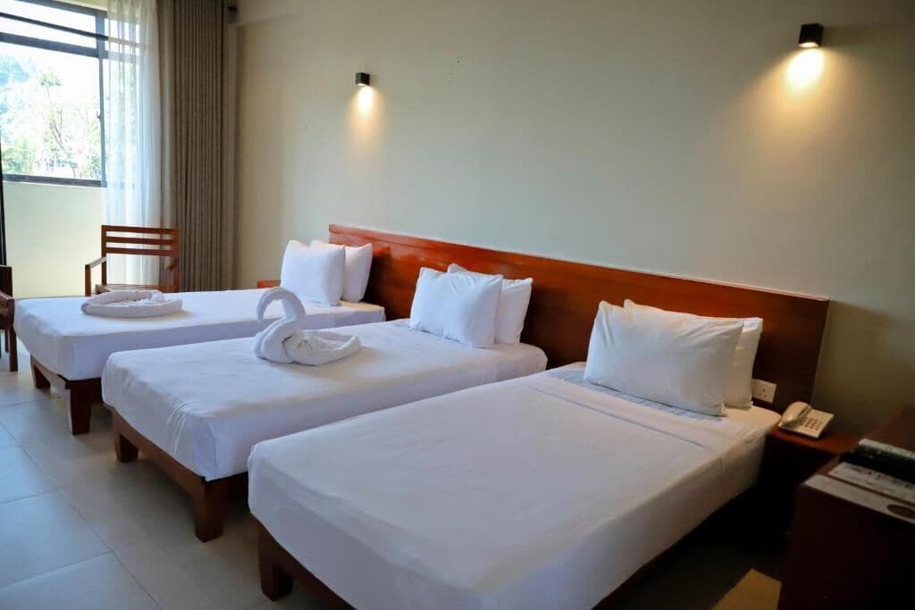 Deluxe Triple Room | In-room safe, laptop workspace, free WiFi