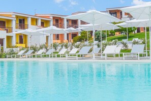 A heated pool - Three-Room Suite: 70 sq m (maximum 6 guests + 1 infant in a cot - 0-2 years old), consisting of a living room with a double sofa bed, a double bedroom and a bedroom with twin beds, a bathroom with shower, and a kitchenette.Some three-room apartments have (Costa Serena)