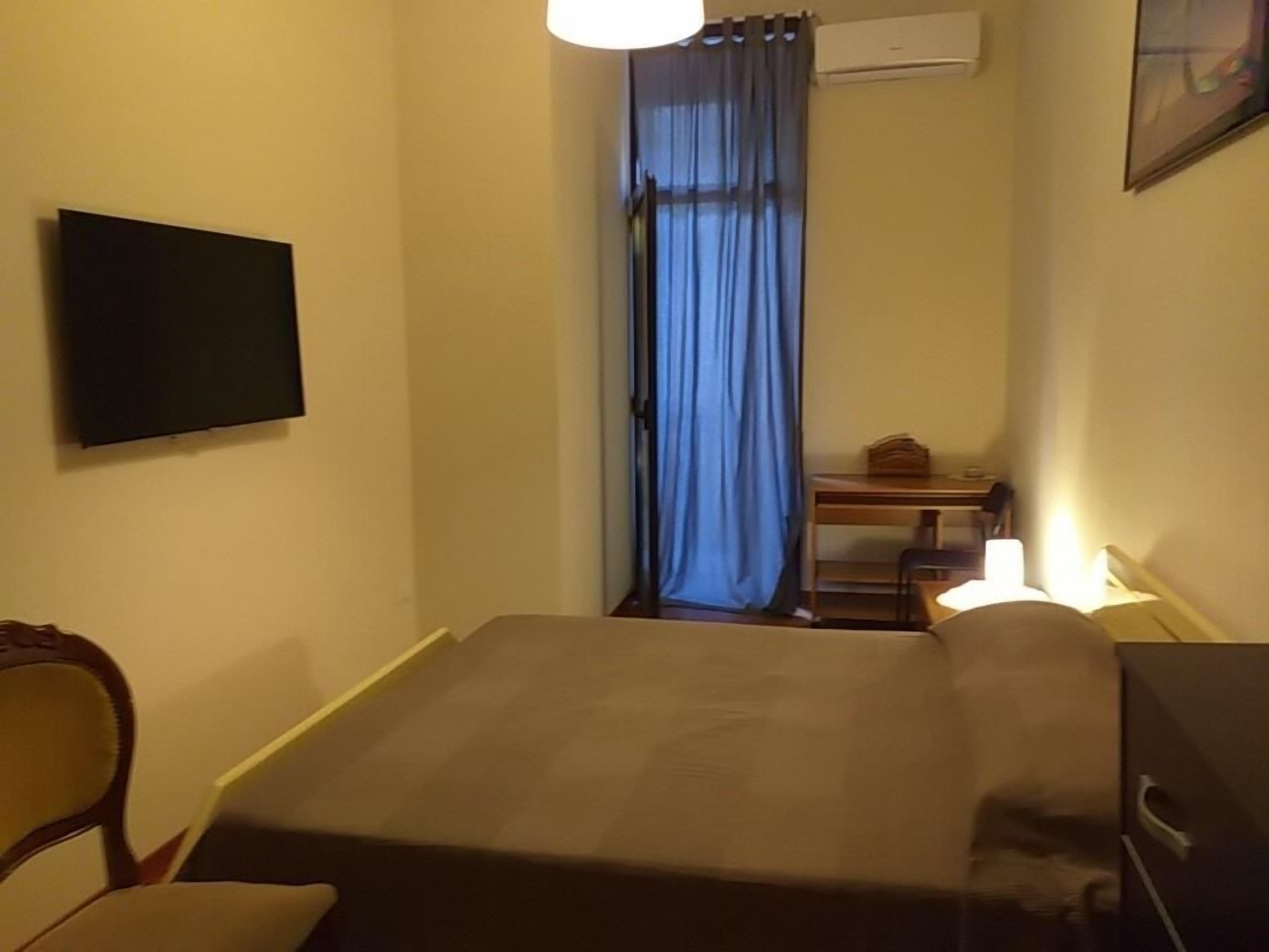 Doppel- oder Zweibettzimmer