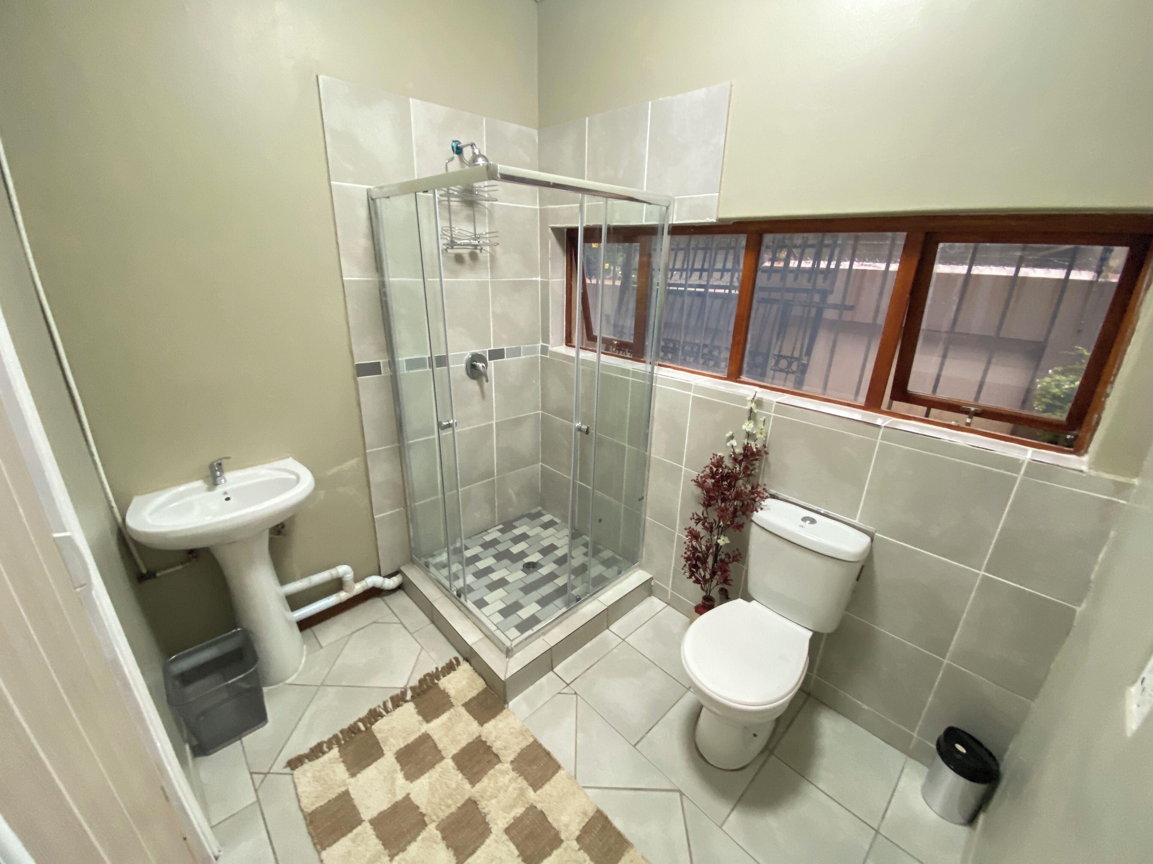 Basic Double Room | Bathroom | Shower, towels, soap, toilet paper