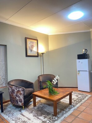 Basic Double Room | Living area | Smart TV