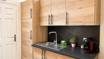 Standard Townhome, 2 Bedrooms, Kitchen | Private kitchen | Full-sized fridge, microwave, oven, stovetop