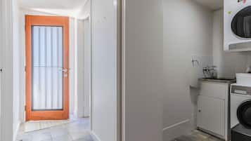 Studio, Balcony, Pool View | Laundry