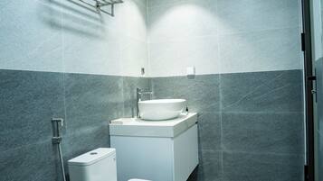 Superior Double Room Single Use | Bathroom | Shower, free toiletries, hair dryer, slippers