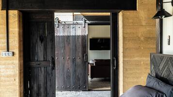 Premium bedding, down duvets, blackout curtains, iron/ironing board