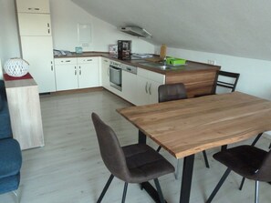 Fridge, dishwasher, coffee/tea maker, cookware/dishes/utensils - Apartment 'Haus Bergblick 1' with Mountain View and Balcony (Riesbürg)
