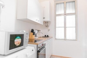 Fridge, oven, stovetop, coffee/tea maker - Chic 2BR Apt | Ideal for Families & Groups (Vienna)