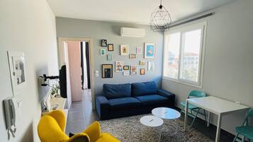 Appartement Supérieur, vue ville | Coin séjour