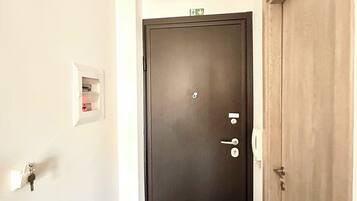 Apartamento estándar, vistas a la ciudad | Zona de estar