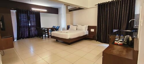 PRATHAM INN BY DOWNTOWN HOTELS