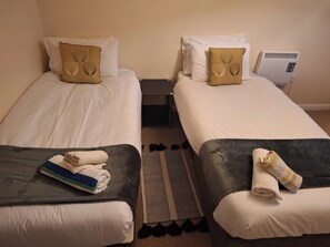 2 slaapkamers, een strijkplank/strijkijzer, gratis wifi, beddengoed