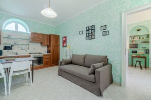 TV - A comfortable, welcoming 40 square meters apartment, perfect for four people, located on the second floor of a period building (NO elevator).The property is located near the Vittorio Emanuele I Bridge in a quiet residential area, well-connected to the ci (Turin)