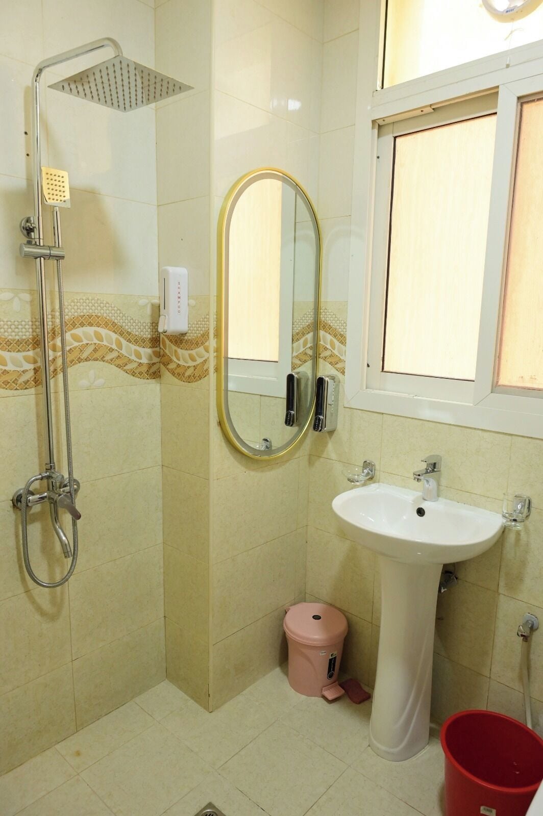 Shower, towels, soap, toilet paper