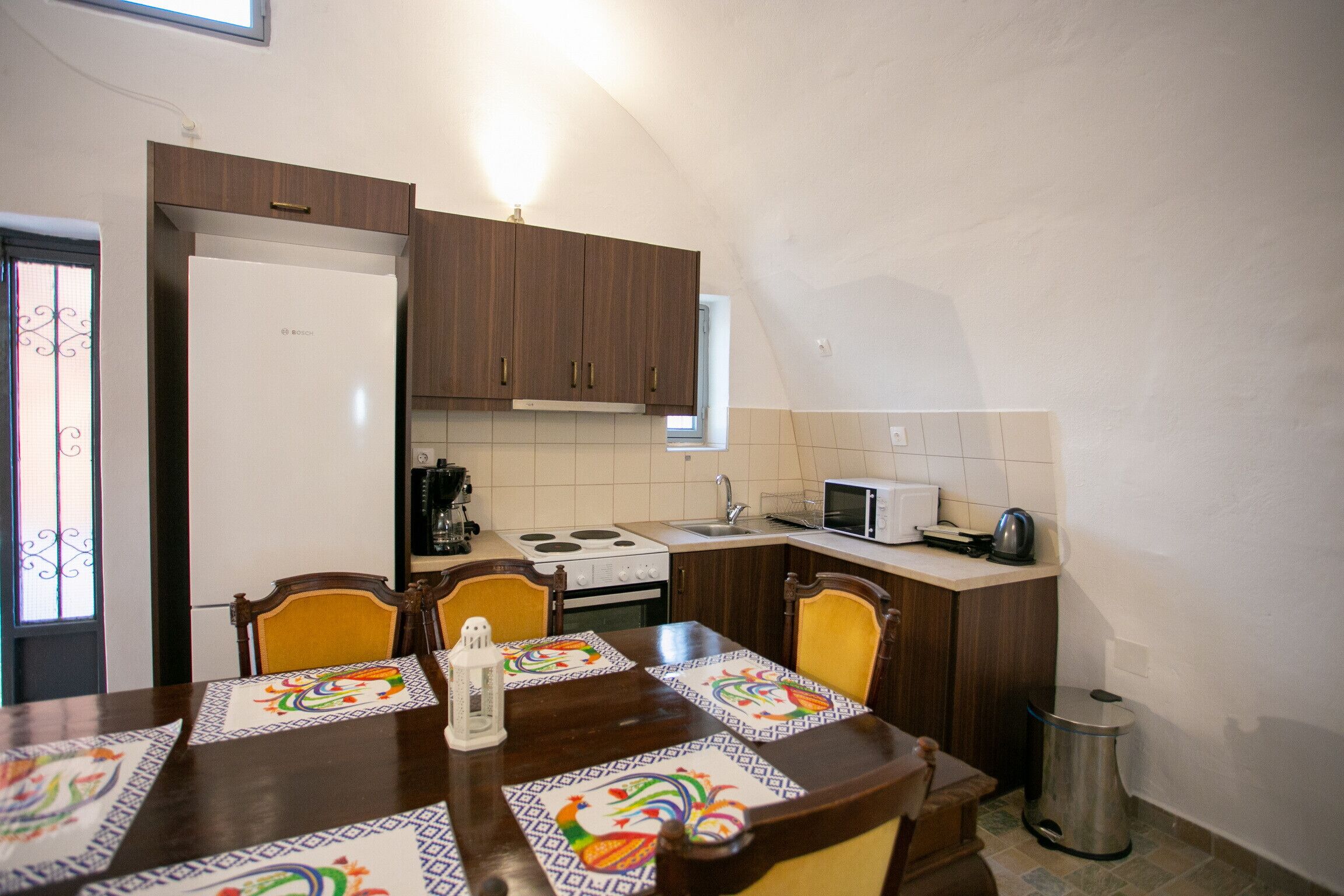 Microwave, coffee/tea maker, high chair, cookware/dishes/utensils