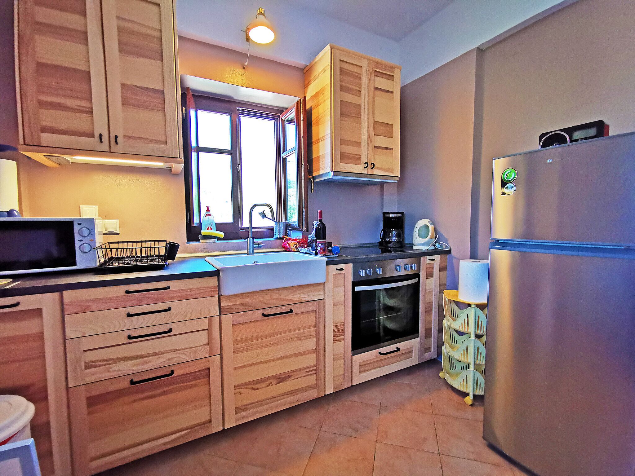 Microwave, coffee/tea maker, highchair, cookware/dishes/utensils