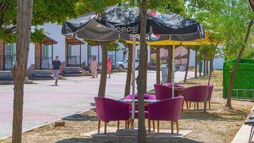 Family Villa, Balcony, Garden View | Living area