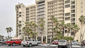 A multi-story hotel with a prominent sign reading "Saida Towers." - Steps to Sand: Resort Escape on South Padre Island (South Padre Island)