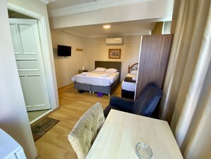 Family Triple Room, Non Smoking, City View | Blackout curtains, iron/ironing board, free WiFi - Meydan Pansiyon (İstanbul)