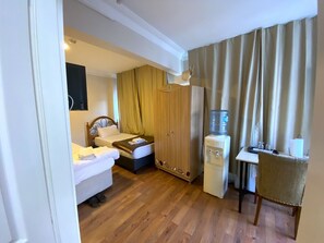 Classic Triple Room, Pets Not Allowed, City View | Blackout drapes, iron/ironing board, free WiFi