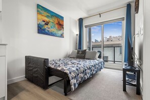 Deluxe Condo, 1 Bedroom, Courtyard View | Living area | 43-inch flat-screen TV with cable channels, Netflix, Hulu - GLOBALSTAY Condo Near the Bow River (Calgary)