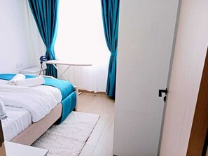 Desk, laptop workspace, iron/ironing board, free WiFi - Orchid Residency View Palace Apartment (Nairobi)