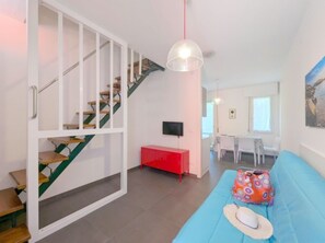 TV - Bright home with covered porch (Bibione)