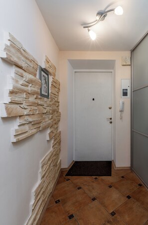 Comfort Apartment, Balcony, Courtyard View | Living area | 35-inch TV with cable channels - Spacious apartments near Pobedy Square (Minsk)