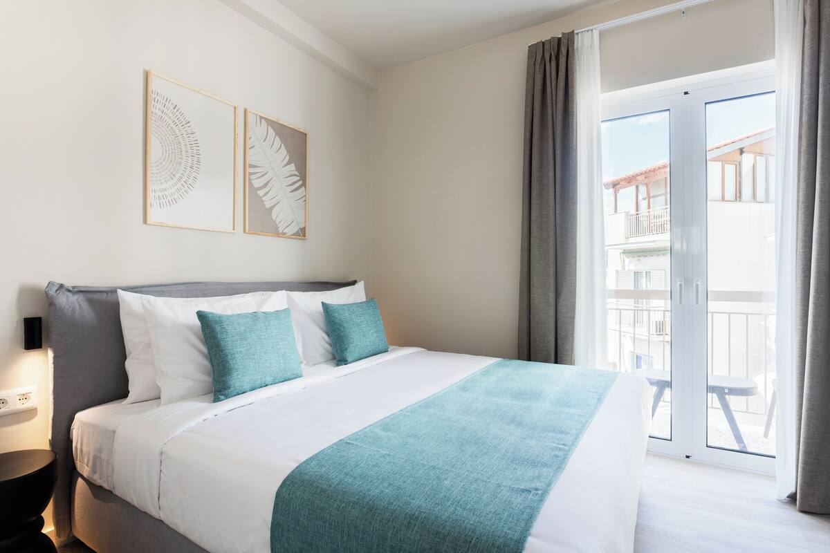 Apartment, 1 Bedroom, Balcony | Laptop workspace, iron/ironing board, free WiFi