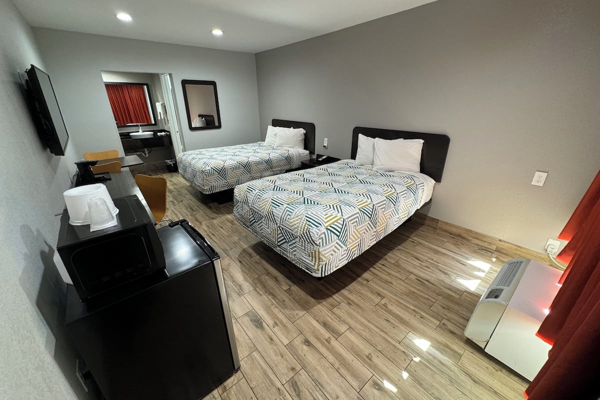 Deluxe Quadruple Room, 2 Double Beds, Non Smoking, Refrigerator | Desk, laptop workspace, iron/ironing board, free WiFi