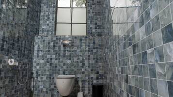 Family Villa, Garden View | Bathroom | Separate bathtub and shower, hair dryer, slippers, towels