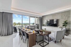 TV - Luxury Oceanfront Condo at Azure | Eagle Beach (Noord)