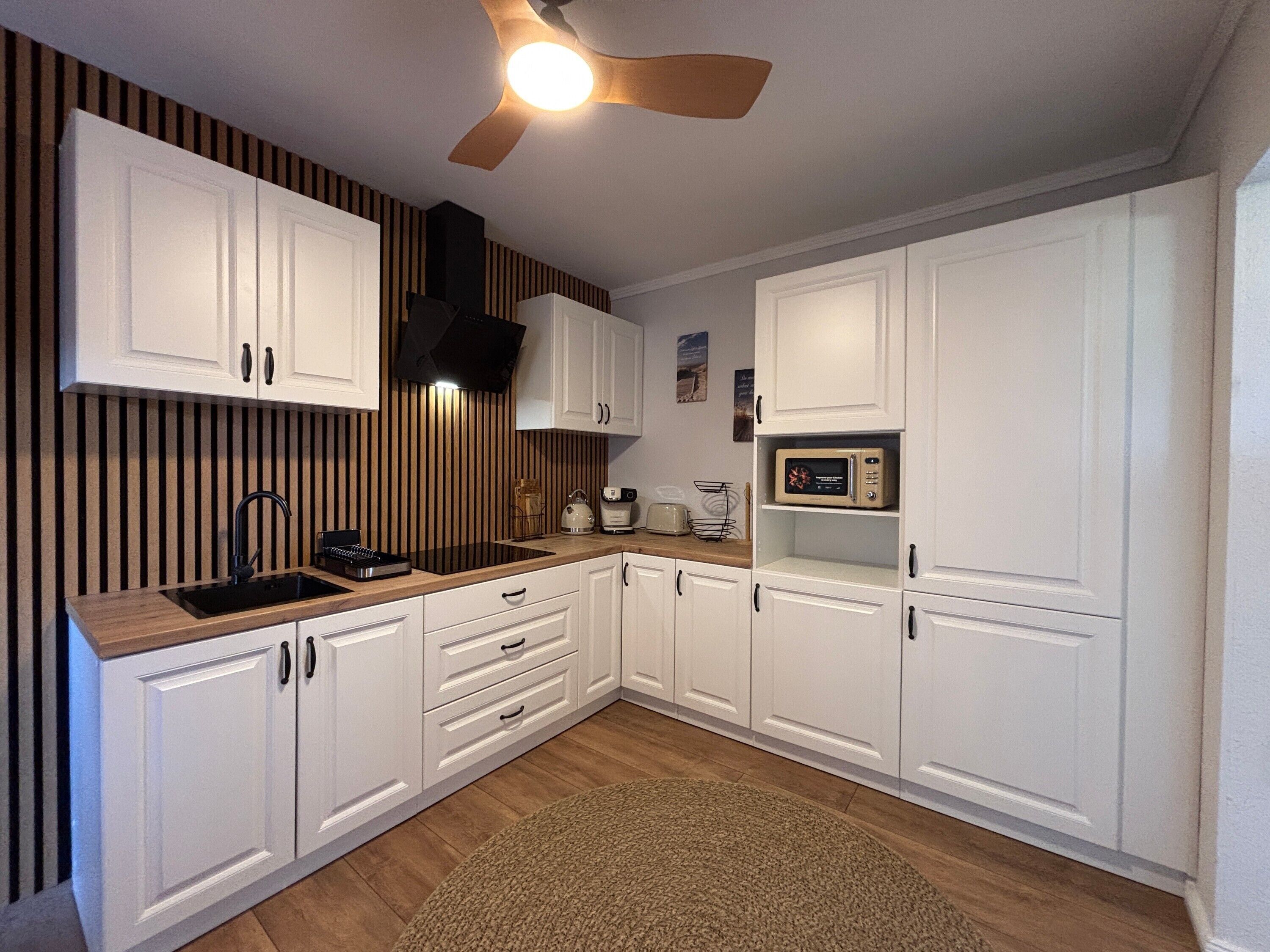 Fridge, microwave, stovetop, coffee/tea maker