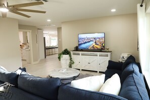 TV - Modern Coastal Villa • Private Fenced Yard • Minutes to the Beach (Naples)