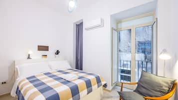 Apartamento clássico | Cortinas blackout, ferros/tábuas de passar roupa, Wi-Fi de cortesia