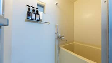 Hair dryer, towels, soap, shampoo
