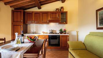 Fridge, stovetop, cookware/dishes/utensils