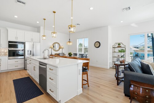 Brand new custom home STEPS from the beach and times square - Unbelievable ocean views, stunning pool and spa and large entertaining space!