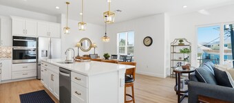 Brand new custom home STEPS from the beach and times square - Unbelievable ocean views, stunning pool and spa and large entertaining space!