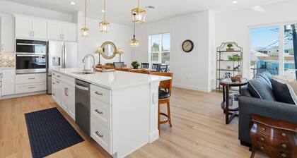 Brand new custom home STEPS from the beach and times square - Unbelievable ocean views, stunning pool and spa and large entertaining space!