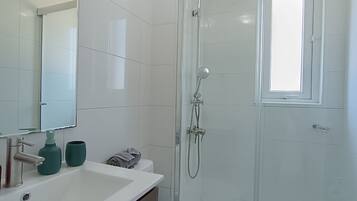 Hair dryer, towels, toilet paper