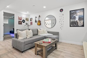 Smart TV, video games - A fun, family friendly lower suite close to WEM with a game room, creative themed rooms, full kitchen, fenced yard & easy parking. (Spruce Grove)