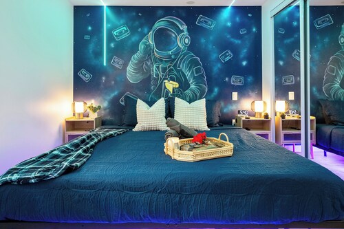 A fun, family friendly lower suite close to WEM with a game room, creative themed rooms, full kitchen, fenced yard & easy parking.