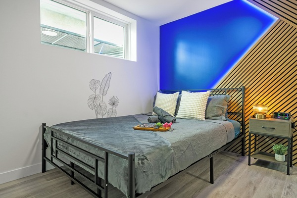 A bold, stylish bedroom designed for comfort, personality, and total relaxation.