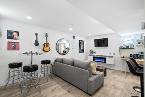 Smart TV, fireplace, video games - A fun, family friendly lower suite close to WEM with a game room, creative themed rooms, full kitchen, fenced yard & easy parking. (Spruce Grove)