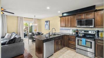 Fridge, microwave, coffee/tea maker, highchair