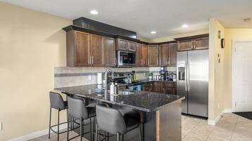 Fridge, microwave, coffee/tea maker, highchair